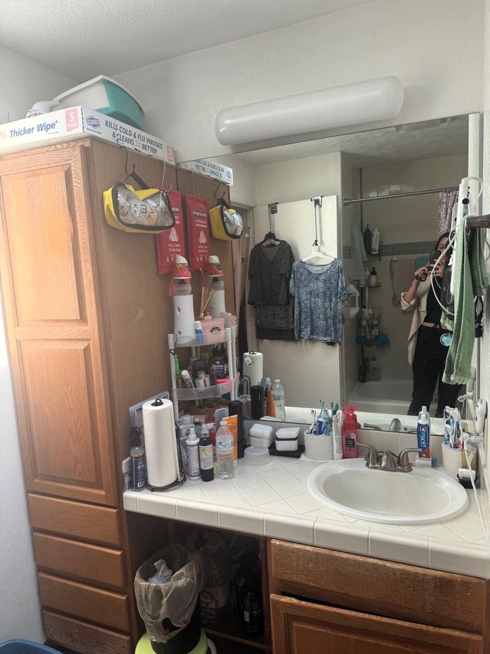 Cramped oak vanity with tile counter, before